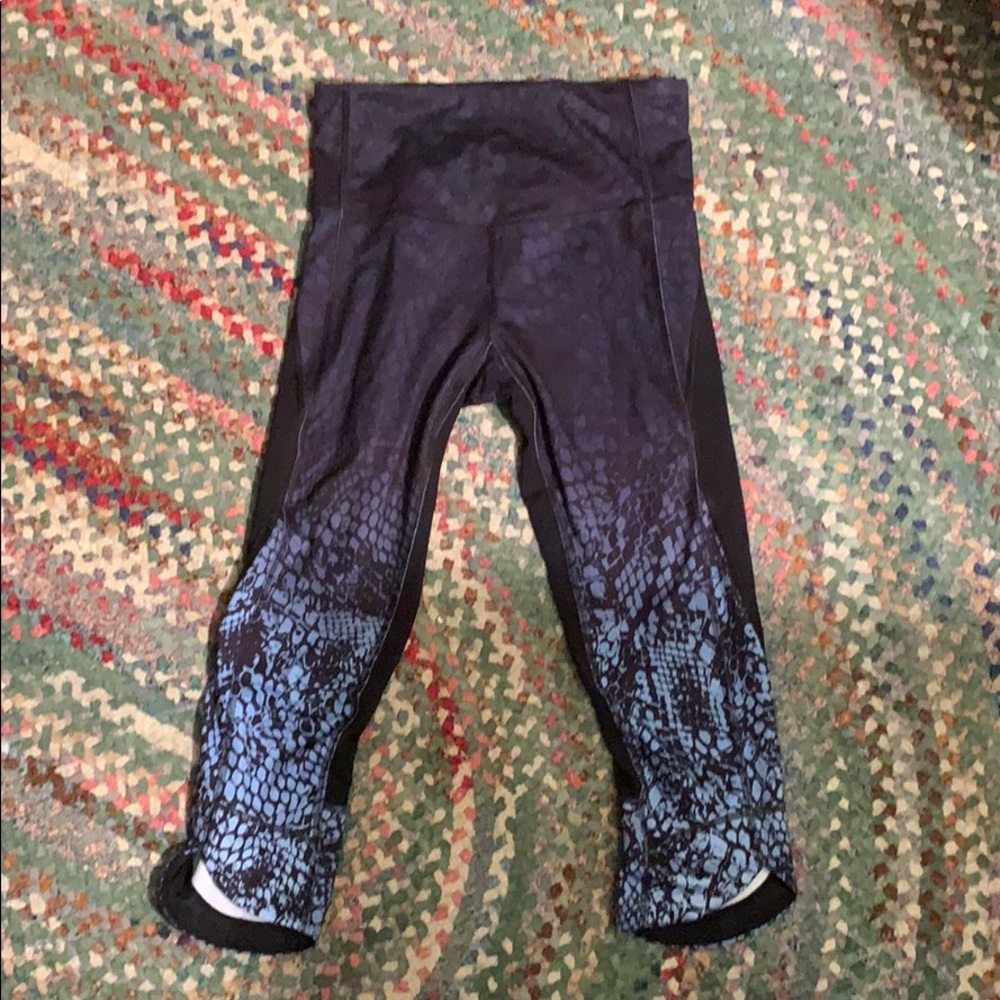 Black and blue leggings with mesh accent